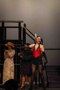 Brenna Murphy as the emcee from Chicago