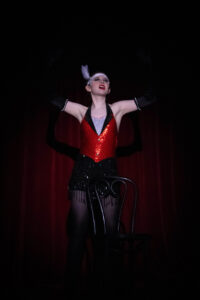 Brenna Murphy as the emcee from Chicago