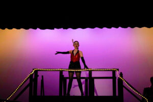 Brenna Murphy as the emcee from Chicago